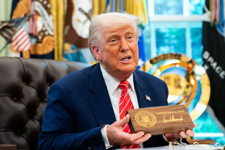 US President Donald Trump speaks during a news conference before presenting Elon Musk with a "key to the White House" in the Oval Office of the White House in Washington, DC, on May 30, 2025.