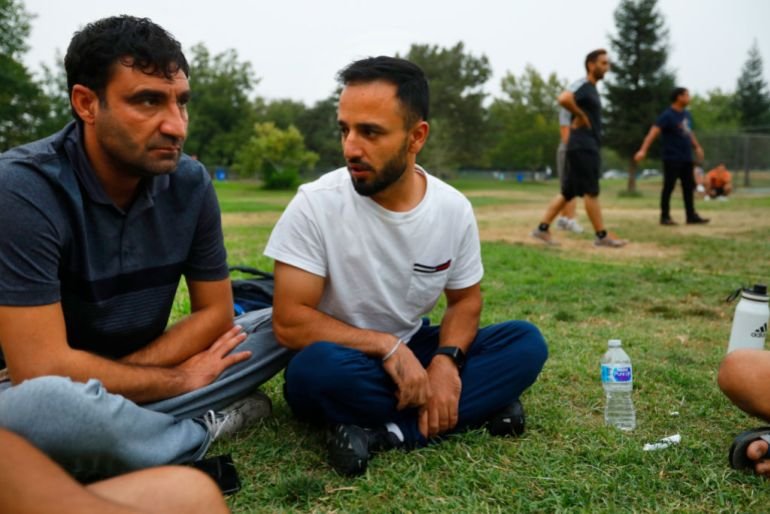 Sacramento, CaliforniaAfghans Shahid Ullah Wafa, left, and Wasel Hoshmand, right, are very concerned about what is happening in thier country and how they can helped those left behind. The Afghan community of Sacramento is one of the largest in the United States. Many Afghan living in the United States worry about their relatives in Afghanistan and what will happen now that the Taliban is back in control. (Carolyn Cole / Los Angeles Times via Getty Images)