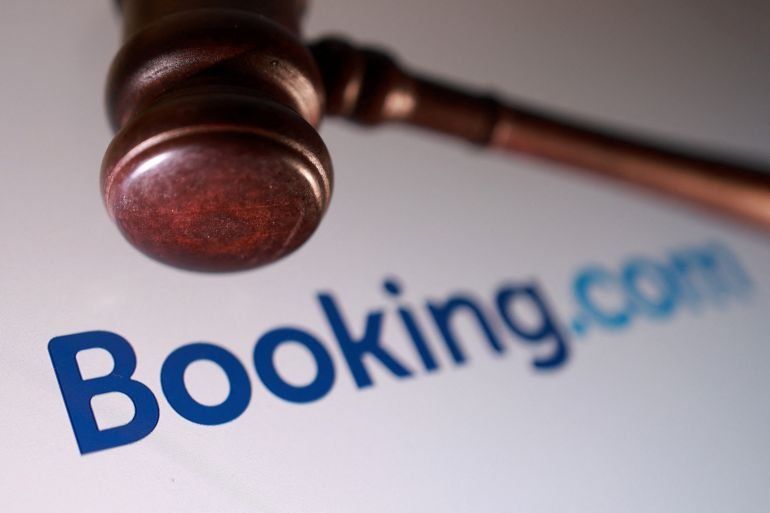 Booking.com logo and court gavel are seen in this illustration taken August 5, 2025. REUTERS/Dado Ruvic/Illustration