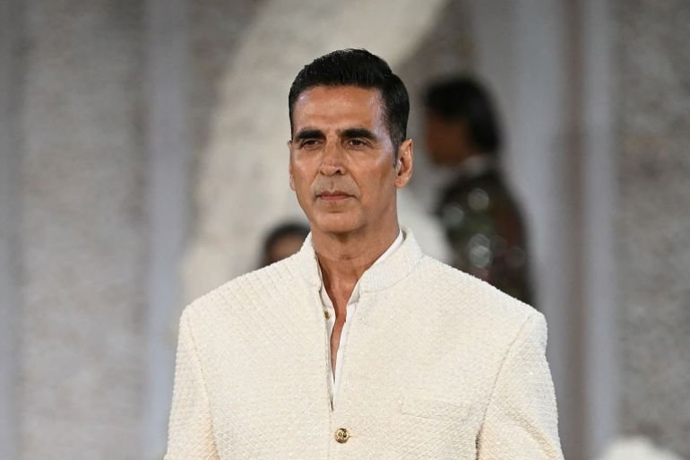 Bollywood actor Akshay Kumar presents a creation by designer Falguni Shane Peacock during India Couture Week in New Delhi on July 25, 2025. (Photo by Money SHARMA / AFP) / IMAGE RESTRICTED TO EDITORIAL USE - STRICTLY NO COMMERCIAL USE -- (Photo by MONEY SHARMA/AFP via Getty Images)