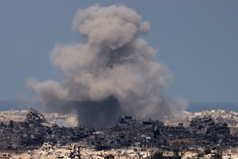 TOPSHOT - This picture taken from a position at Israel's border with the Gaza Strip shows smoke billowing amid Israeli bombardment of the besieged Palestinian territory on September 16, 2025.