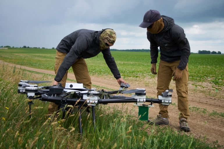 Engineers test a Ukrainian-made quadcopter drone at an undisclosed location in Ukraine, June 12, 2025. (AP Photo/Efrem Lukatsky)