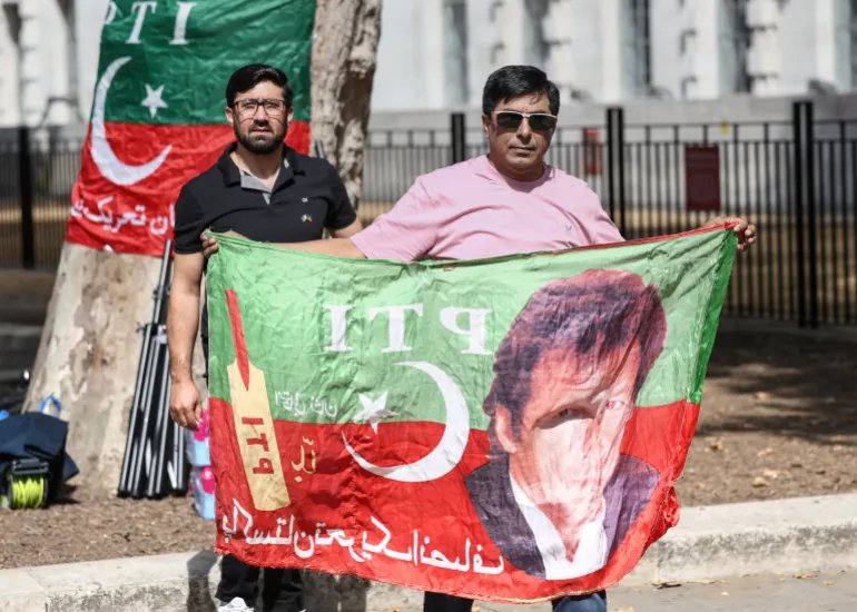 Supporters of Pakistan's jailed former prime minister Imran Khan hold a rally opposite Downing Street in central London on August 23, 2026.