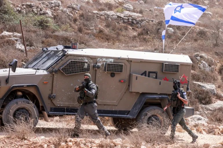 TOPSHOT - Israeli soldiers arrive in the village of Qusra, south of Nablus in the Israeli-occupied West Bank, which has faced escalating Israeli settler violence over the past month, on August 29, 2026.