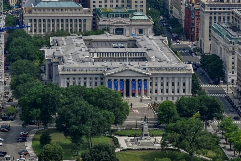 FILE PHOTO: The U.S. Department of the Treasury Building in Washington, D.C., U.S., July 11, 2026. REUTERS/Daniel Heuer/File Photo