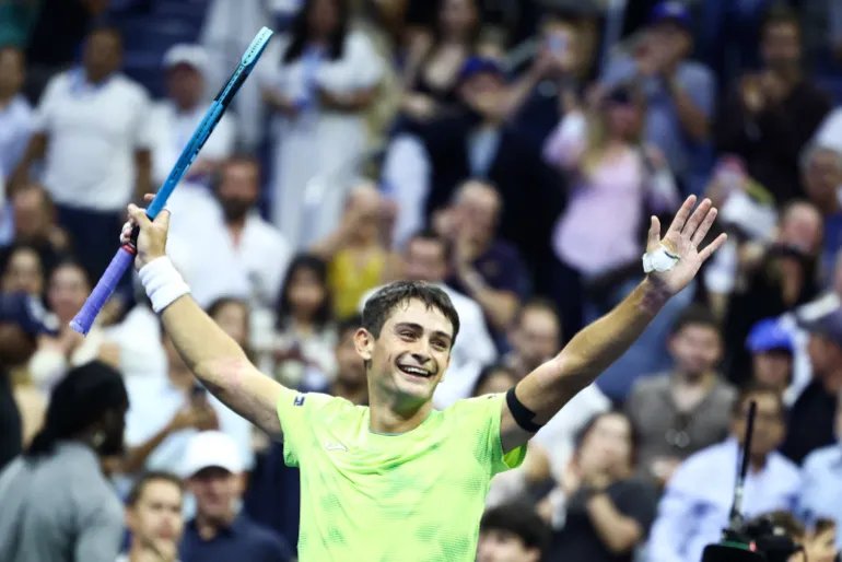 Argentina's Mariano Navone celebrates after upsetting Serbia's Novak Djokovic during the men's singles first round tennis match on day one of the US Open tennis tournament at the USTA Billie Jean King National Tennis Center in New York City on August 30, 2026. (Photo by CHARLY TRIBALLEAU / AFP)