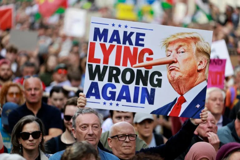 People take part in a protest against the visit of US President Donald Trump in the Irish capital Dublin on September 12, 2026.