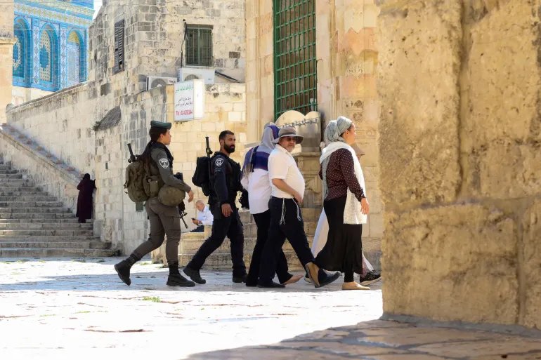 Israeli forces escort Jewish visitors roaming Al-Aqsa compound to mark the Rosh Hashanah holiday, the Jewish New Year, in Jerusalem, September 13, 2026. REUTERS/Sinan Abu Mayzer