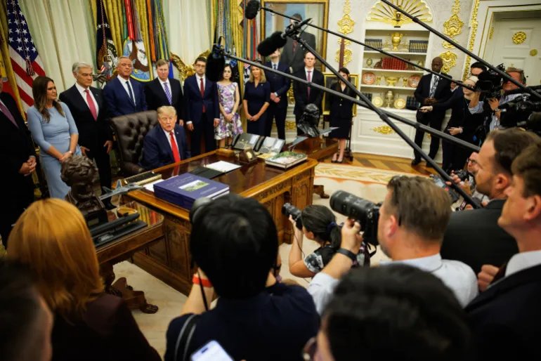 epa13249098 US President Donald Trump answers questions from reporters after announcing new 'most favored nation' pricing for certain drugs in the Oval Office of the White House in Washington, DC, USA, 18 September 2026. The policy aims to allow state Medicaid programs to access lower drug prices negotiated by foreign nations. EPA/Samuel Corum / POOL