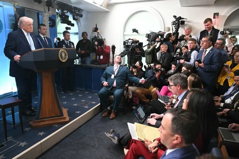 US President Donald Trump listens to a question from a reporter during a press conference about the conflict in Iran in the James S. Brady Press Briefing Room of the White House on April 6, 2026, in Washington, DC. (Photo by SAUL LOEB / AFP)