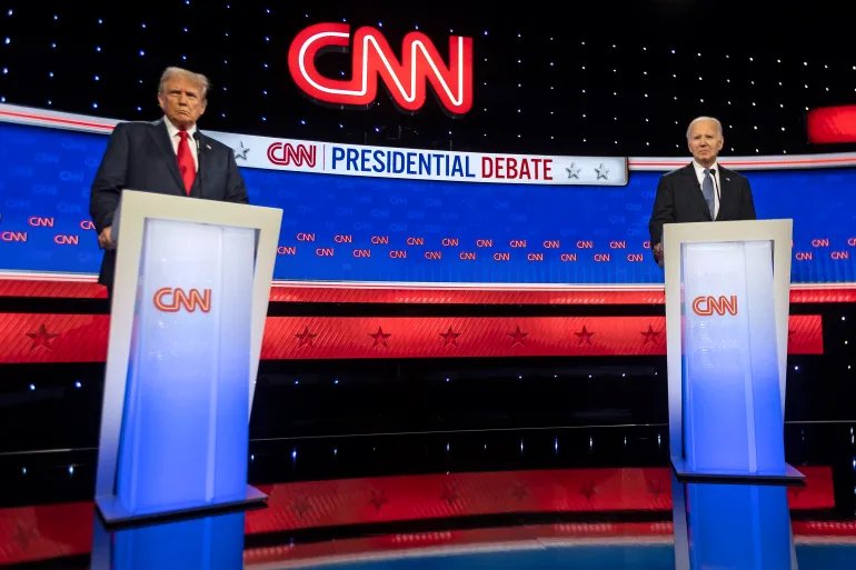 US President Joe Biden and former US President and Republican presidential candidate Donald Trump participate in the first presidential debate of the 2024 elections at CNN's studios in Atlanta, Georgia, on June 27, 2024. (Photo by CHRISTIAN MONTERROSA / AFP)