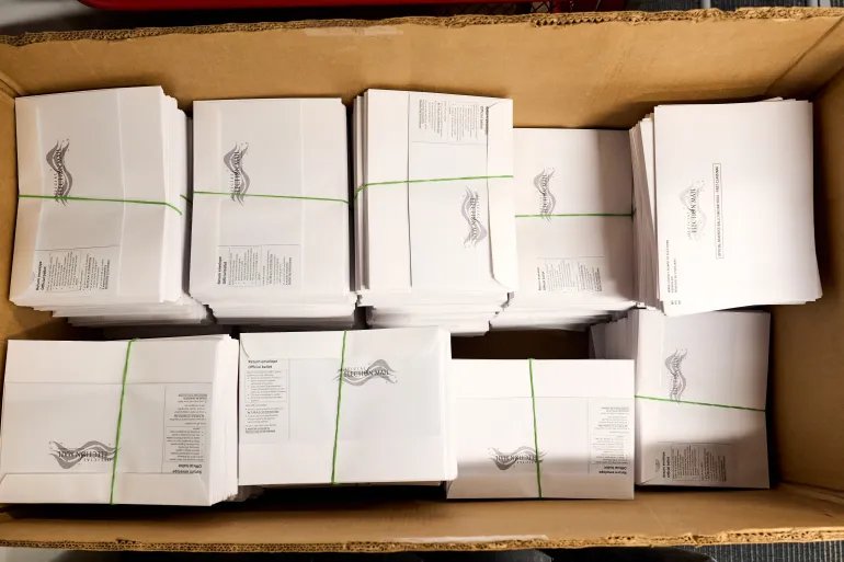 A large box of pre-assembled mail-in ballots at the Wake County Board of Elections on Thursday, Sept. 3, 2026, in Raleigh, N.C. (AP Photo/Matt Ramey)