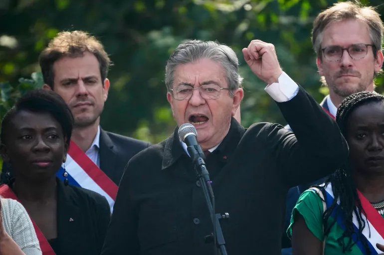 French far-left leader Jean-Luc Melenchon attends a demonstration in protest of the government's release of next year's draft budget, in Paris, Tuesday, Sept. 29, 2026. (AP Photo/Teresa Suarez)