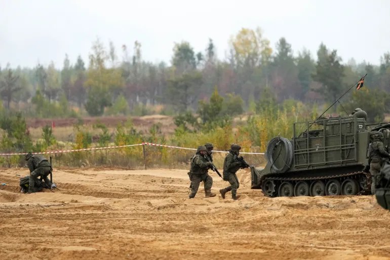 Spanish army servicemen of NATO enhanced Forward Presence battle group take part in the the final phase of the Silver Arrow 2022 military drill on Adazi military training grounds, Latvia September 29, 2022. REUTERS/Ints Kalnins