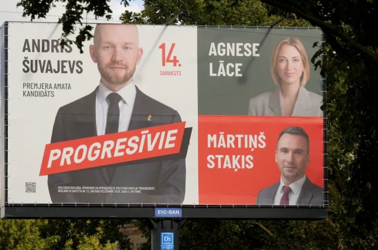 FILE PHOTO: An election campaign poster of the "Progressives" party is pictured before the general election in Riga, Latvia, September 27, 2026. REUTERS/Ints Kalnins/File Photo