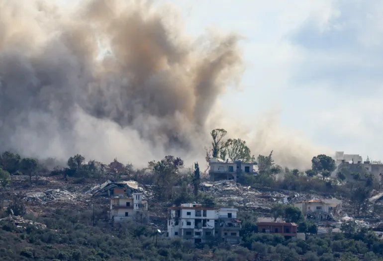 Smoke rises following an explosion in Mansouri, as seen from Henniye, Lebanon, September 29, 2026. REUTERS/Mohamed Azakir