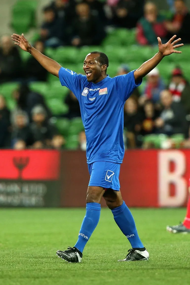 MELBOURNE, AUSTRALIA - JULY 25: Eric Djemba Djemba of Manchester United Legends celebrates a Louis Saha goal during the match between the Liverpool Legends and the Manchester United Legends at AAMI Park on July 25, 2017 in Melbourne, Australia. (Photo by Robert Prezioso/Getty Images)