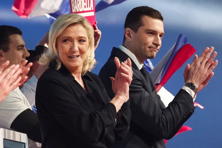 President of the French far-right National Rally (Rassemblement National-RN) party Jordan Bardella and Marine Le Pen, parliamentary party leader of the French far-right National Rally, attend a political rally to launch the party's campaign for the European elections, in Marseille, France, March 3, 2024. REUTERS/Gonzalo Fuentes
