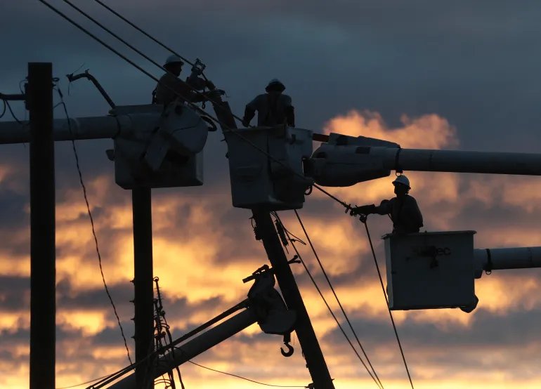 MILTON, FLORIDA - OCTOBER 10: Linemen work on restoring power after Hurricane Isaias passed through the area on October 10, 2026, in Milton, Florida. Thousands of people remain without power after Hurricane Isaias made landfall as the season's first Atlantic hurricane with category two winds. Joe Raedle/Getty Images/AFP (Photo by JOE RAEDLE / GETTY IMAGES NORTH AMERICA / Getty Images via AFP)