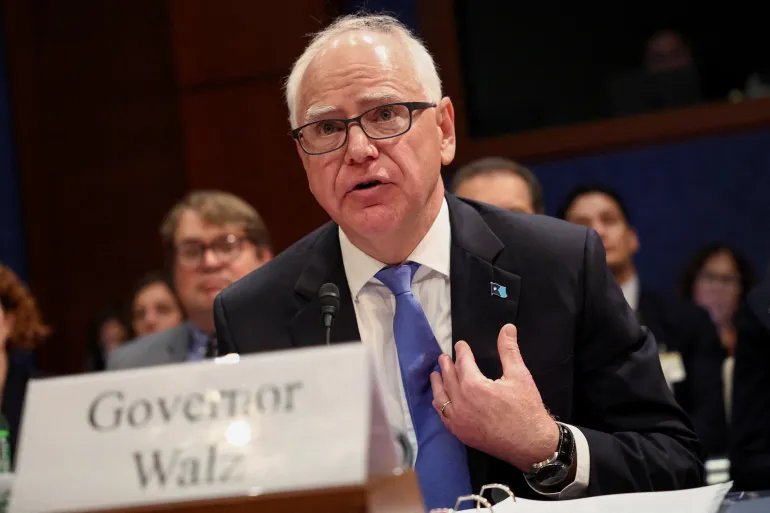 FILE PHOTO: Minnesota Governor Tim Walz testifies during a House Oversight Committee hearing with U.S. governors about state policies regarding undocumented migrants, on Capitol Hill in Washington, D.C., U.S., June 12, 2025. REUTERS/Kevin Lamarque/File Photo