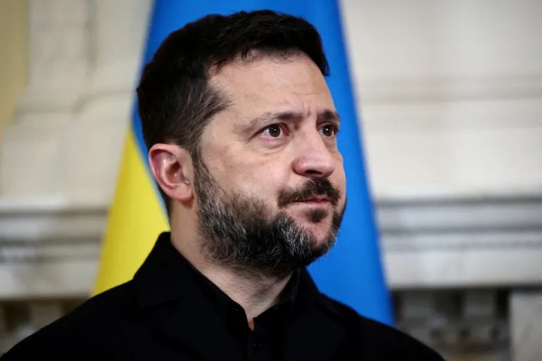 FILE PHOTO: Ukraine's President Volodymyr Zelenskiy reacts during a meeting with Britain's Prime Minister Andy Burnham at 10 Downing Street, in central London, on October 14, 2026. HENRY NICHOLLS/Pool via REUTERS/File Photo