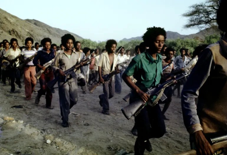 Young men and women undergo military training at an Eritrean People's Liberation Front (EPLF) camp in the highlands of northern Eritrea, Ethiopia, 18th June 1978. (Photo by Alex Bowie/Getty Images)